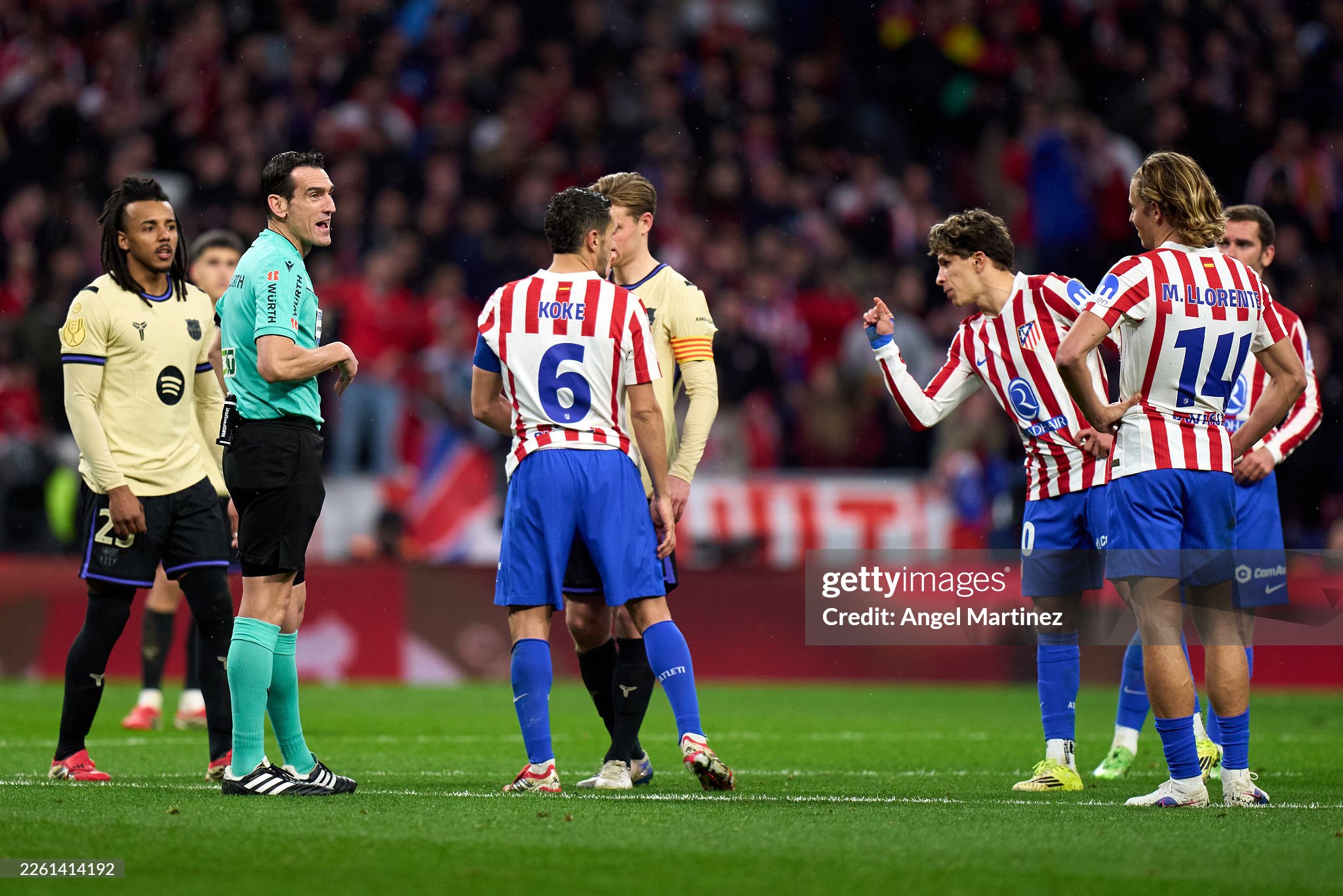 Barcelona humiliated by Atletico, referees under fire